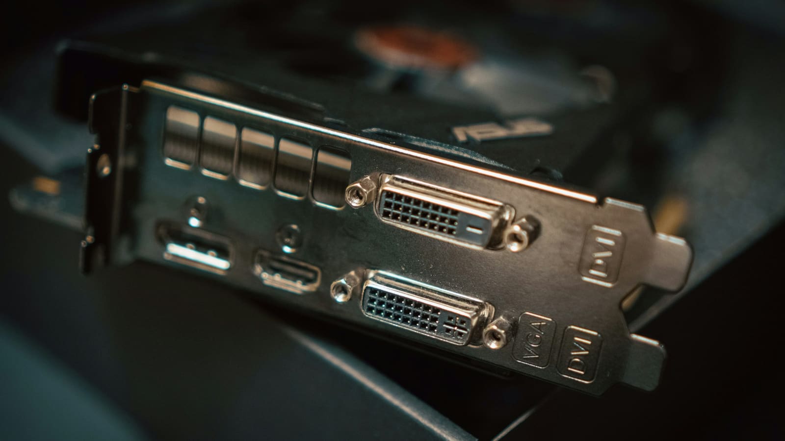 Close-up of the display outputs on the bracket of a graphics card