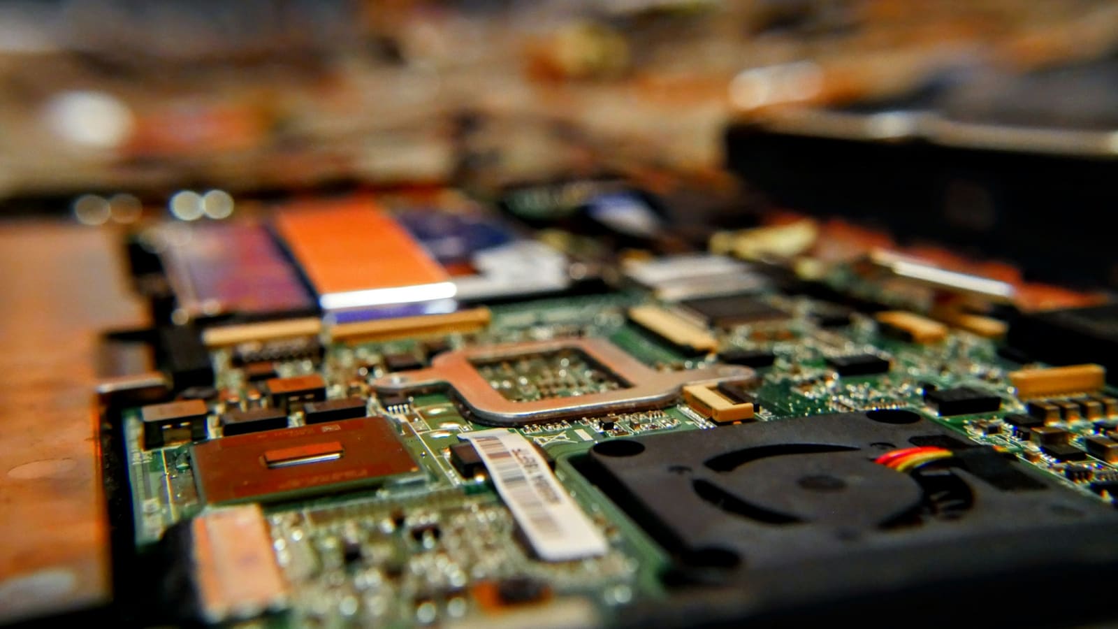 The inside of an opened machine showing its boards and connectors