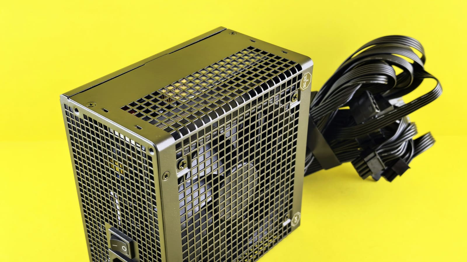 A black computer power supply unit with its cables attached