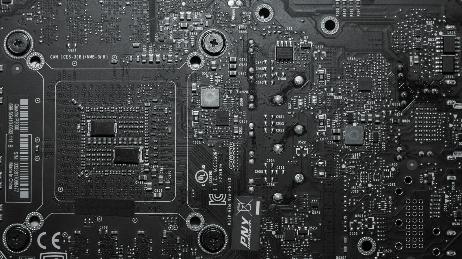 Macro photograph of the bare circuit board of a graphics card