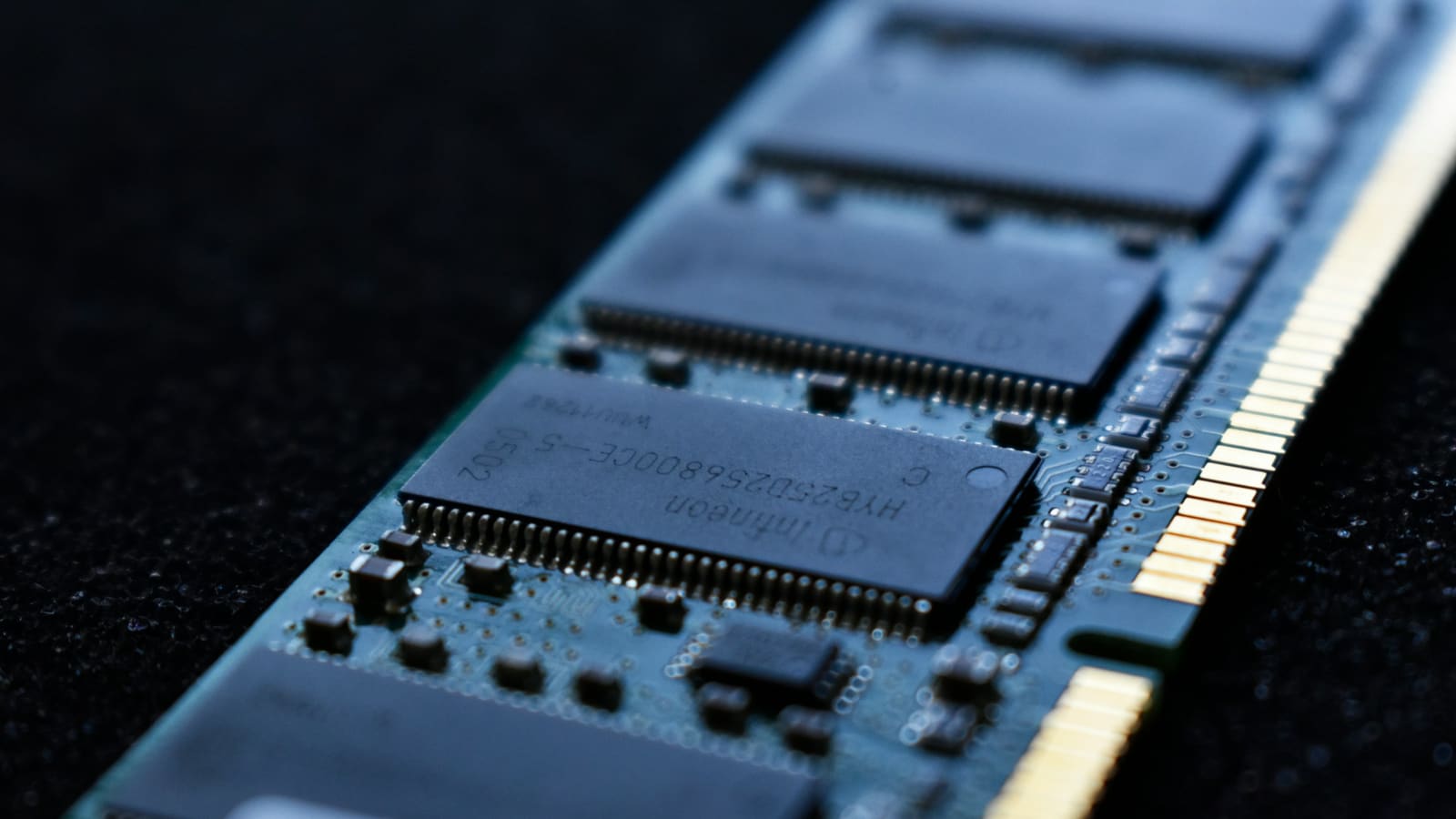 Macro photograph of memory chips soldered to a circuit board