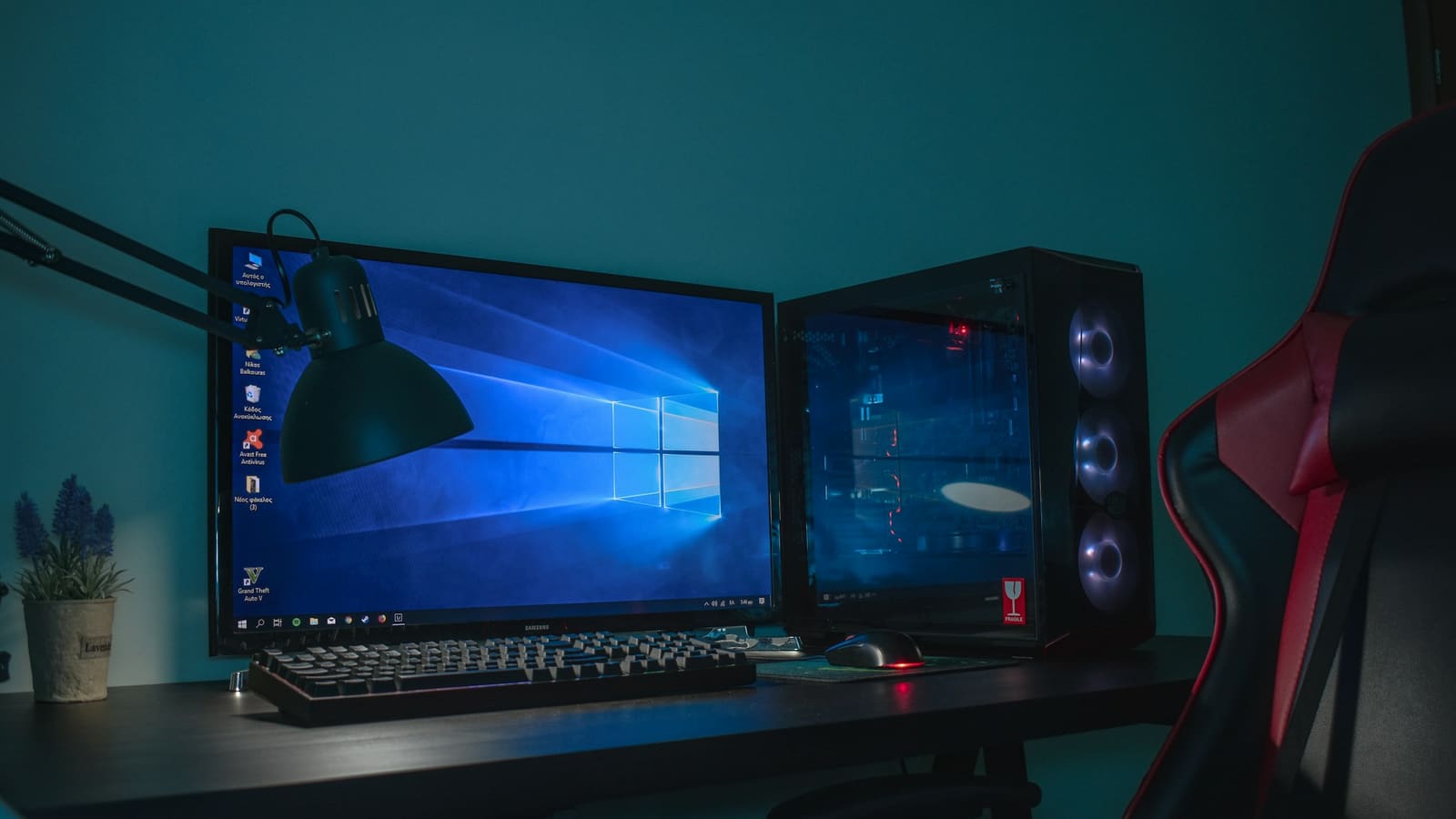 A desktop computer and monitor set up and running on a desk