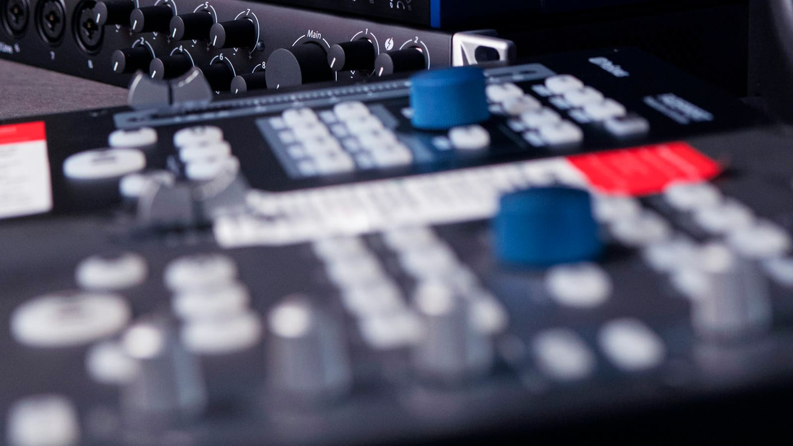 Close-up of switches and controls on an audio control surface